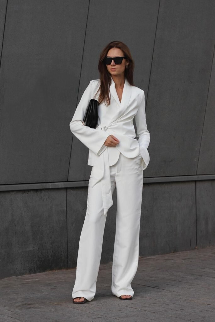 White Wrap-Style Blazer + White Wide-Leg Trousers + Black Strappy Sandals
