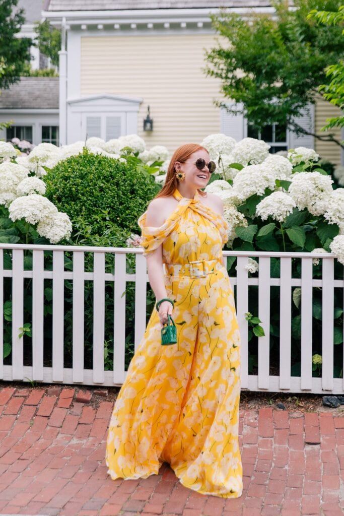 Yellow Floral Halter Jumpsuit + Green Mini Handbag + Tortoise Sunglasses