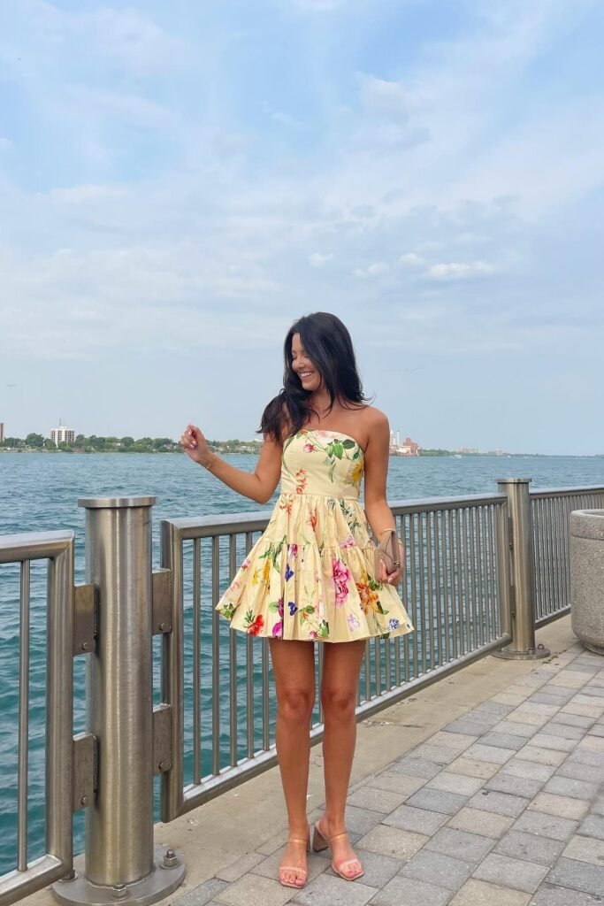 Yellow Floral Strapless Mini Dress + Beige Clutch + Nude Block Heel Sandals