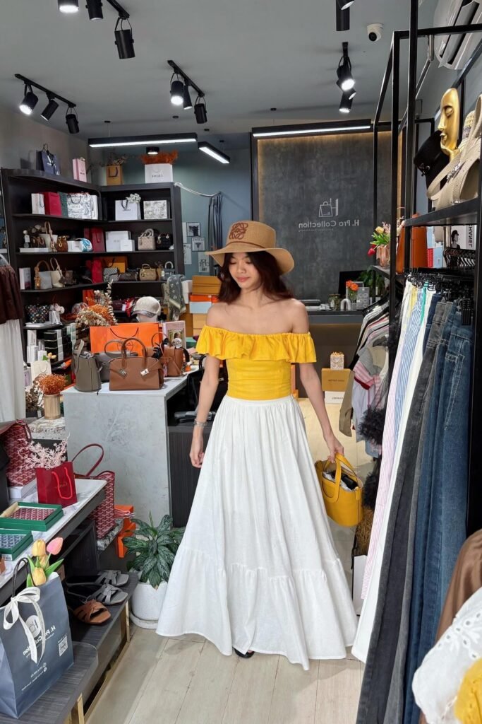 Yellow Off-the-Shoulder Ruffle Top + White Tiered Cotton Skirt + Black Flats