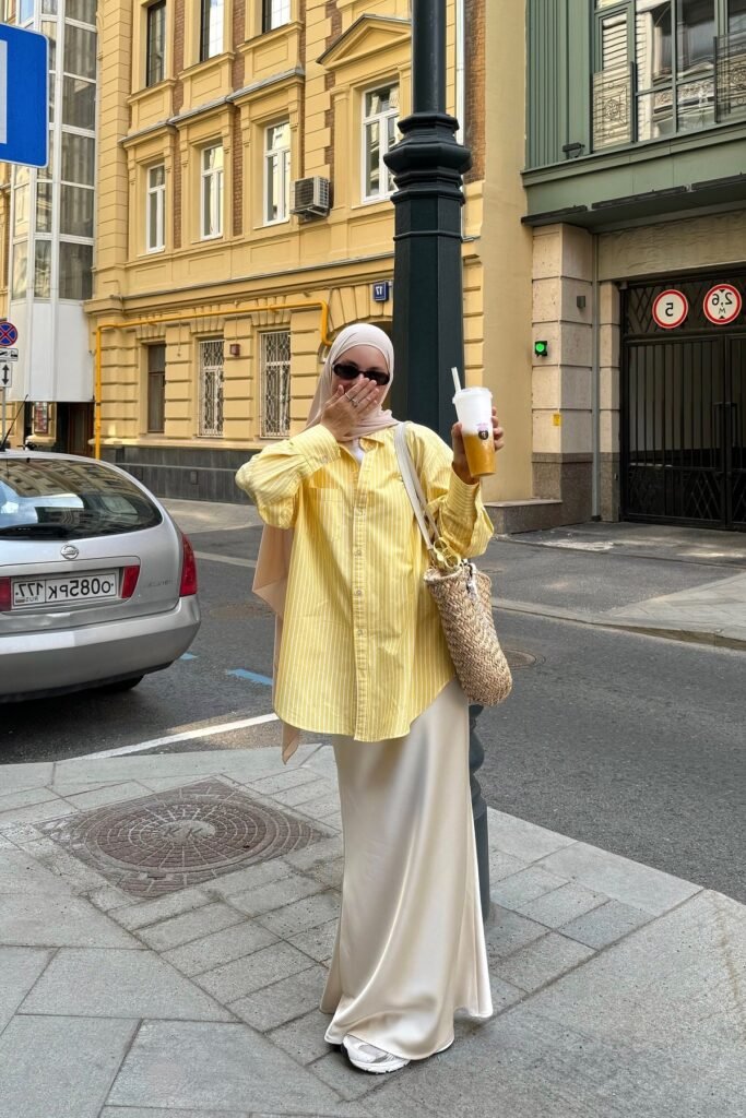 Yellow Striped Button-Up + White Satin Skirt + Woven Straw Tote