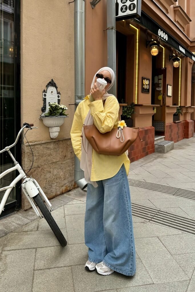 Yellow Striped Button-Up + Wide-Leg Denim Jeans + Brown Shoulder Bag