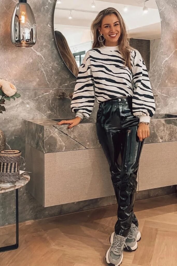 Zebra Print Balloon-Sleeve Sweatshirt + Black Patent Leather Trousers + Grey Chunky Sneakers