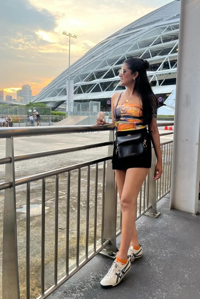 Abstract Print Tube Top + Black Mini Skirt + White & Blue Sneakers