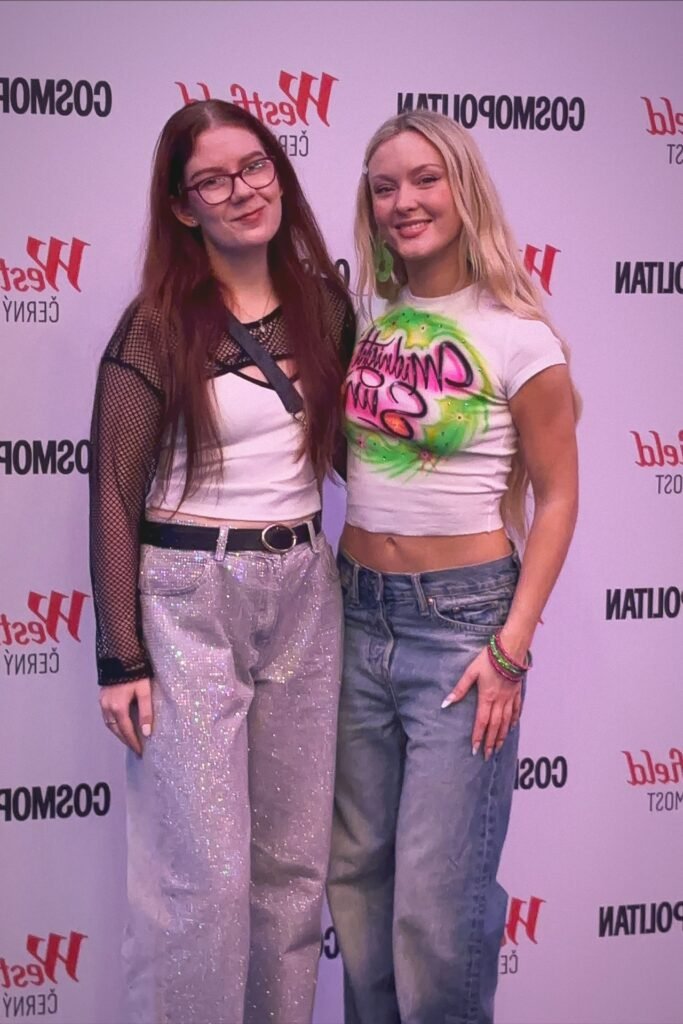 Airbrushed Graphic T-Shirt + Light Wash Wide-Leg Jeans + Pink Hoop Earrings