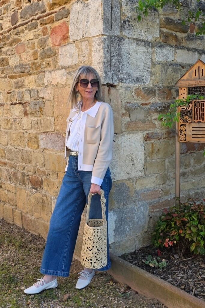 Beige and White Color-Block Cardigan + White Ruffled Blouse + Blue Wide-Leg Jeans + White Lace-Up Ballet Flats