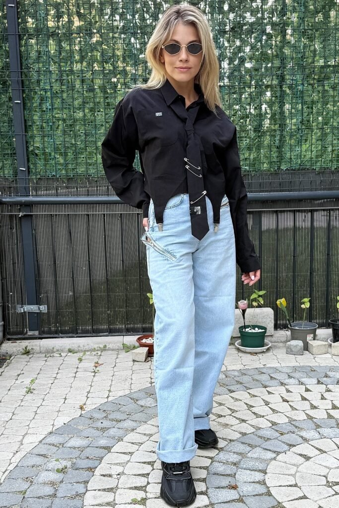 Black Asymmetrical Button-Down with Tie + Light Wash Wide-Leg Jeans + Black Chunky Sneakers