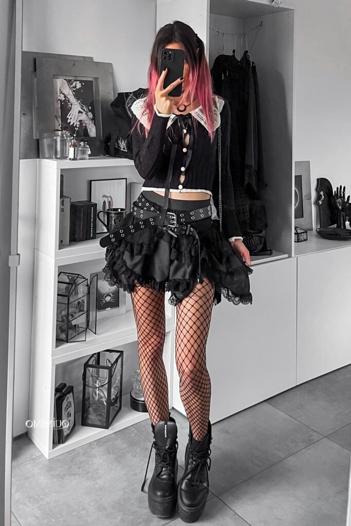 Black Cardigan with White Scalloped Collar + Ruffled Black Mini Skirt + Fishnet Tights + Platform Combat Boots