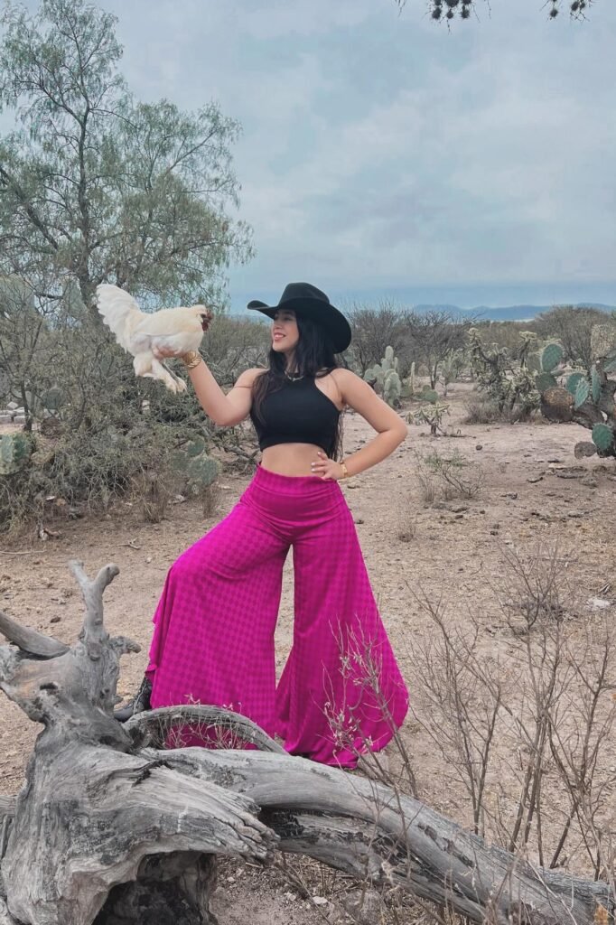 Black Cowboy Hat + Black High-Neck Crop Top + Hot Pink Wide-Leg Trousers