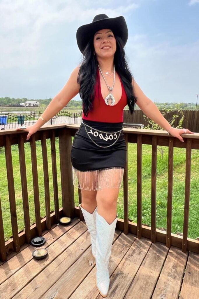 Black Cowboy Hat + Red Halter Bodysuit + Black Mini Skirt with Silver Fringe + White Glitter Boots