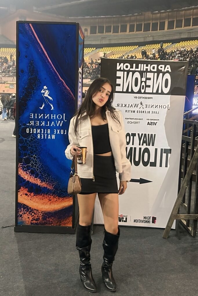 Black Crop Top and Mini Skirt Set + Off-white Structured Jacket + Black Knee-high Boots