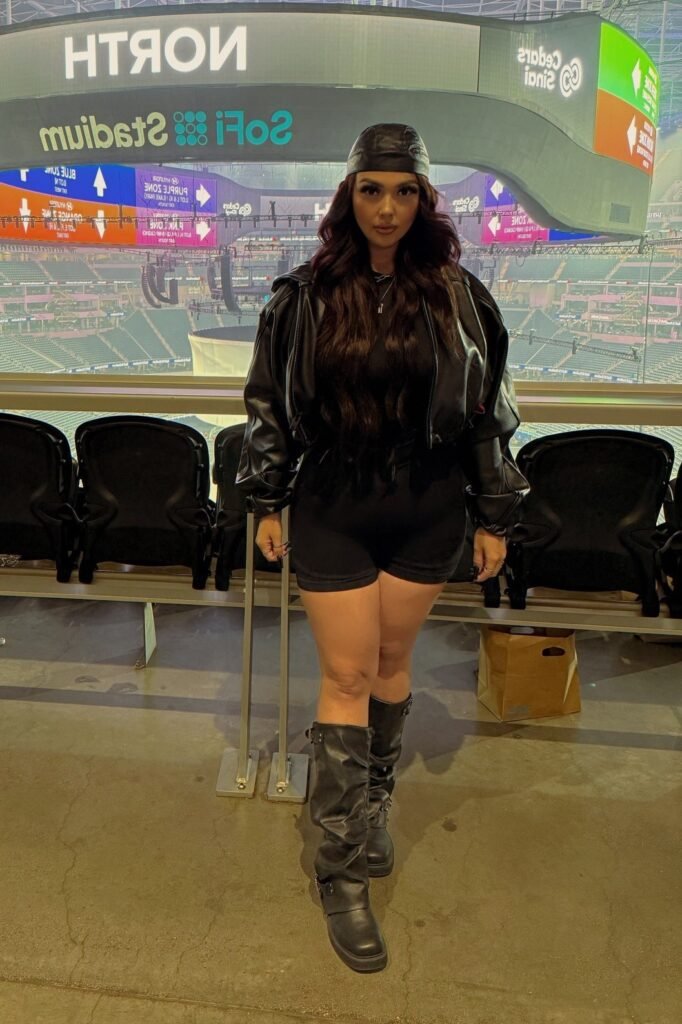 Black Cropped Leather Jacket + Black High-Waisted Shorts + Black Slouchy Buckle Boots