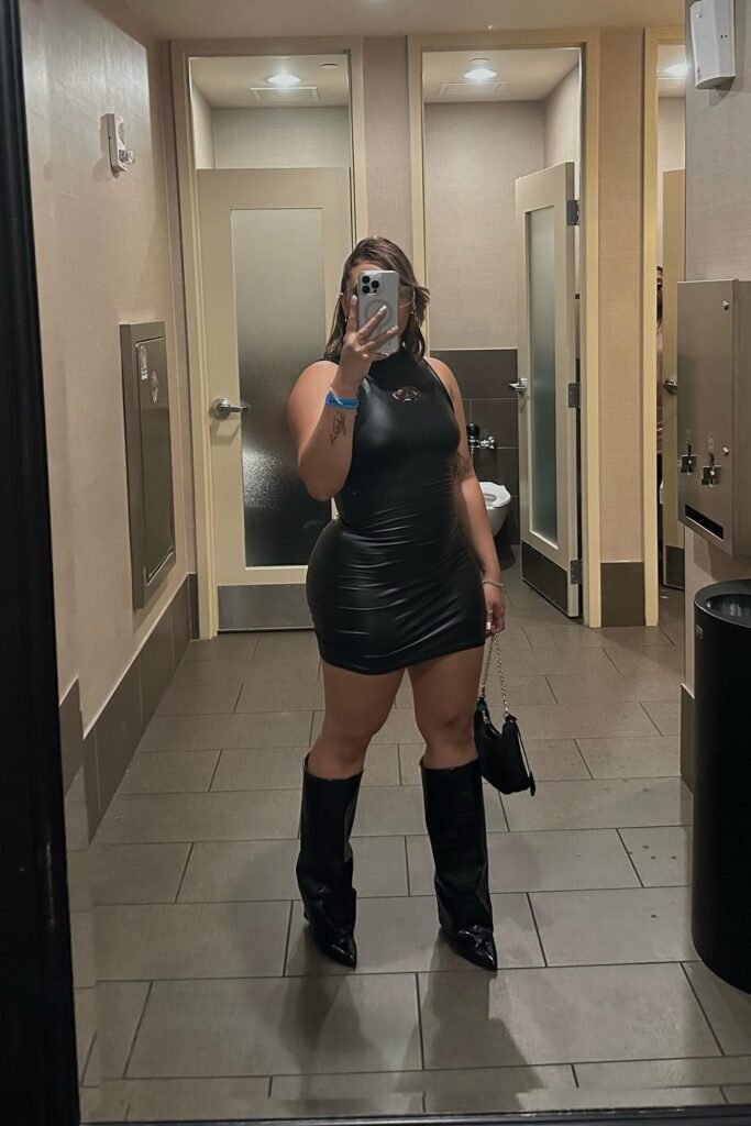 Black Faux-Leather Mini Dress + Black Knee-High Pointed Boots + Black Chain Strap Bag