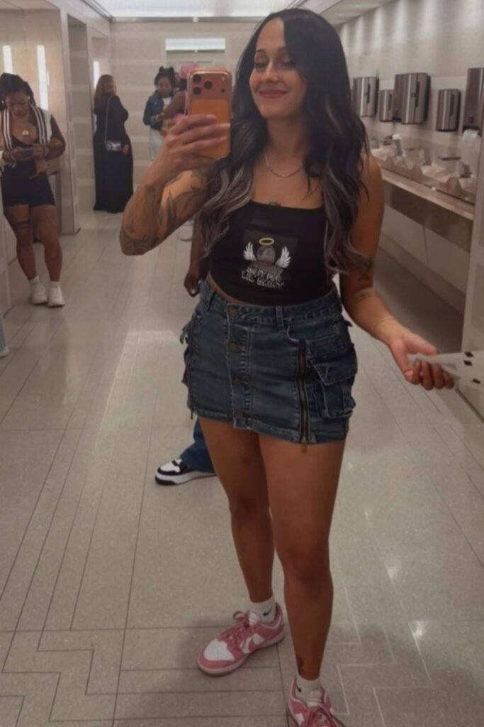 Black Graphic Crop Top + Denim Cargo Mini Skirt + Pink and White Sneakers