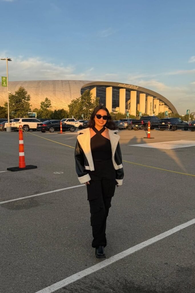 Black Halter Neck Top + Black Cargo Pants + Shearling-Lined Leather Aviator Jacket