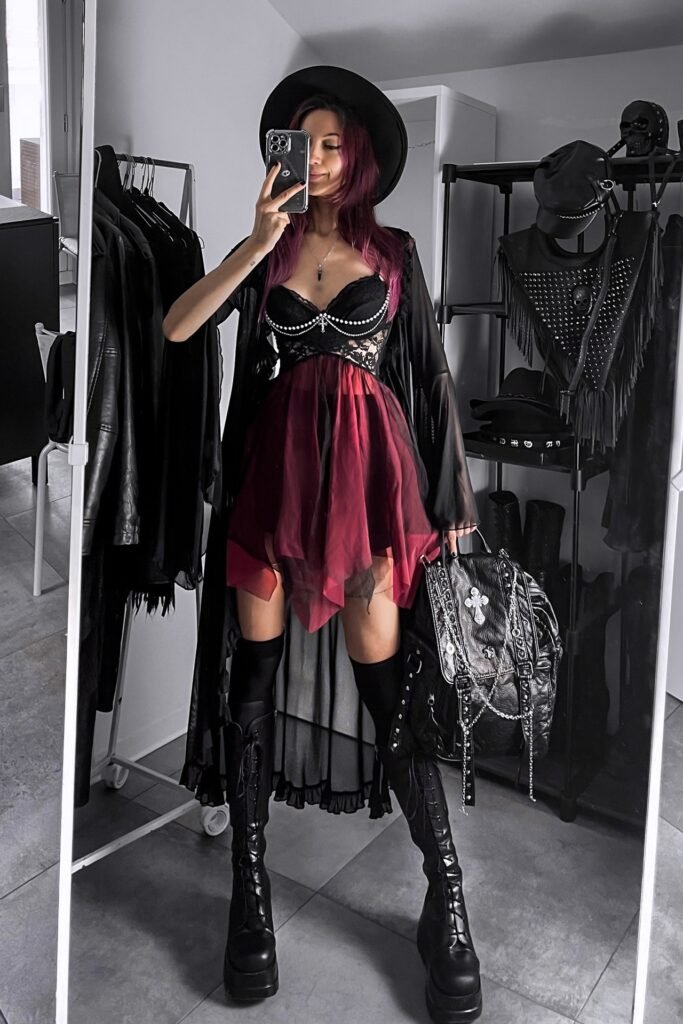 Black Lace Bustier + Red Tulle Overlay Dress + Sheer Black Robe + Platform Combat Boots + Wide-Brimmed Hat