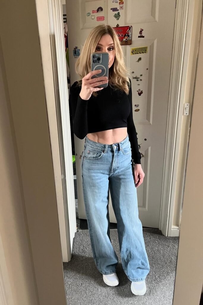 Black Long-Sleeve Crop Top + Light Wash Wide-Leg Jeans + White Sneakers