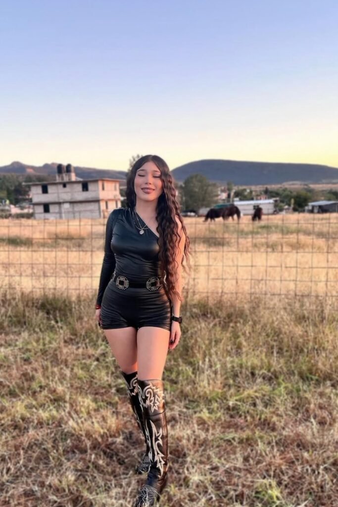 Black Long-Sleeve Romper + Double Buckle Belt + Over-the-Knee Western Boots