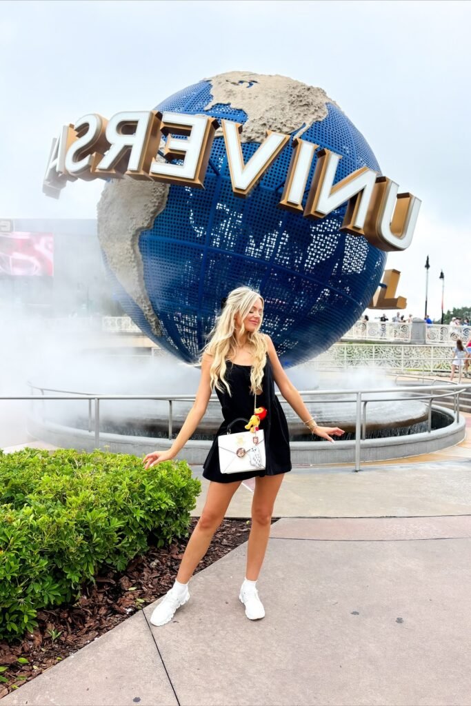 Black Mini Dress + White Sneakers + White Crossbody Bag + Blonde Hair