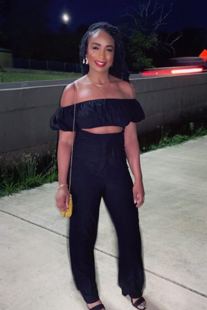 Black Off-the-Shoulder Crop Top + High-Waisted Black Trousers + Black Strappy Sandals