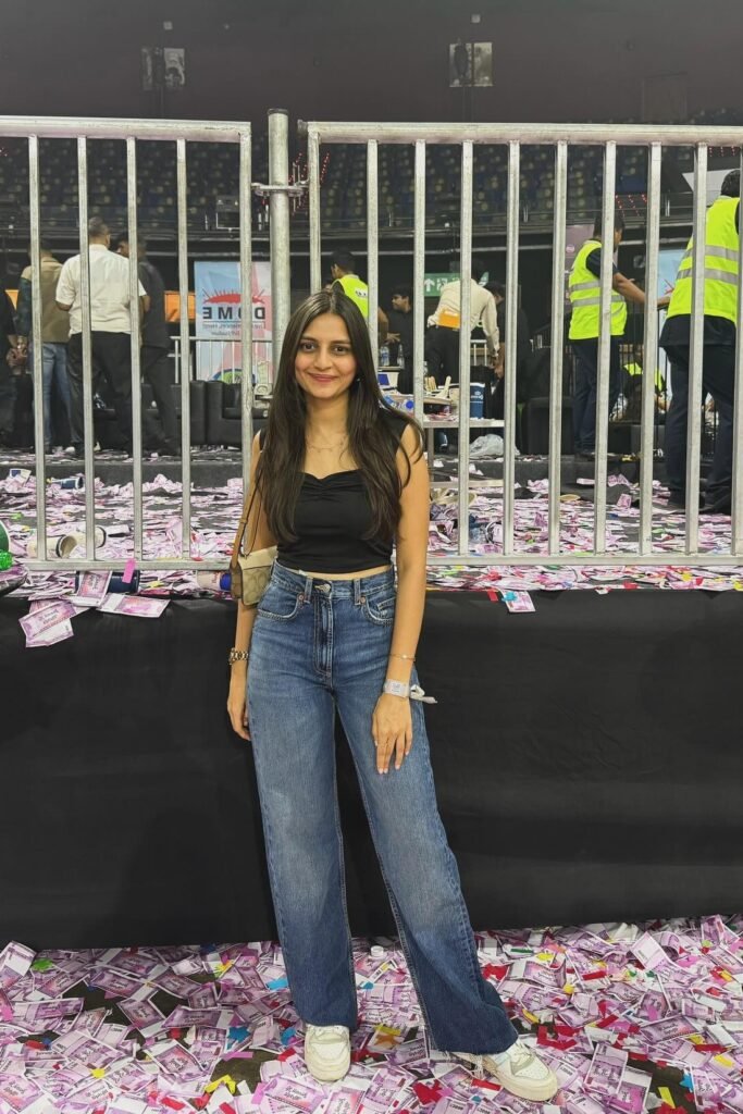 Black Ruched Crop Top + Blue Straight-Leg Jeans + White Sneakers