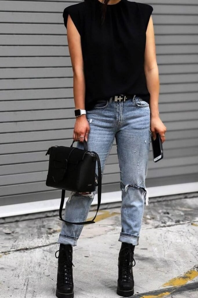 Black Sleeveless Muscle Tee + Distressed Light Wash Jeans + Black Lace-up Platform Boots