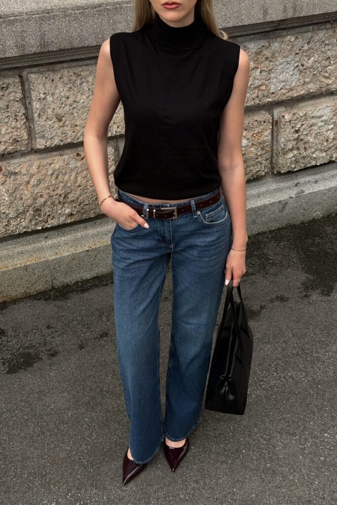 Black Sleeveless Turtleneck + Medium Wash Straight Jeans + Black Tote Bag + Burgundy Pointed-Toe Heels