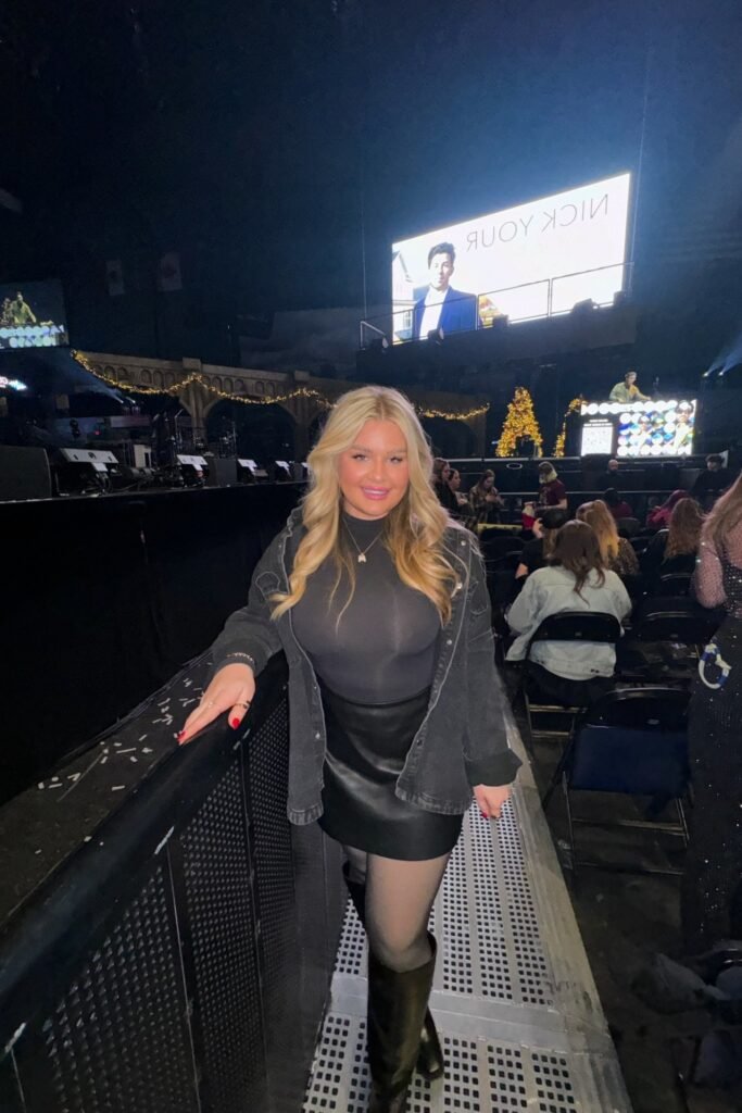 Black Turtleneck Top + Black Denim Jacket + Black Leather Mini Skirt + Black Knee-High Boots