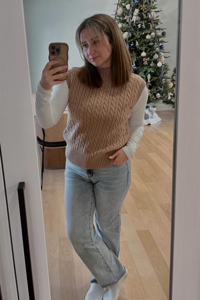 Brown Cable-Knit Sweater Vest + White Long-Sleeve Turtleneck + Light Wash Straight-Leg Jeans + White Socks