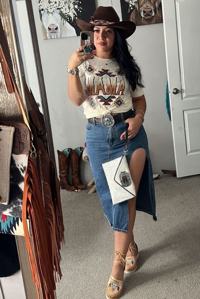 Brown Cowboy Hat + Graphic "MAMA" T-Shirt + Denim Midi Skirt with Slit + Turquoise Statement Belt + Cowhide Clutch