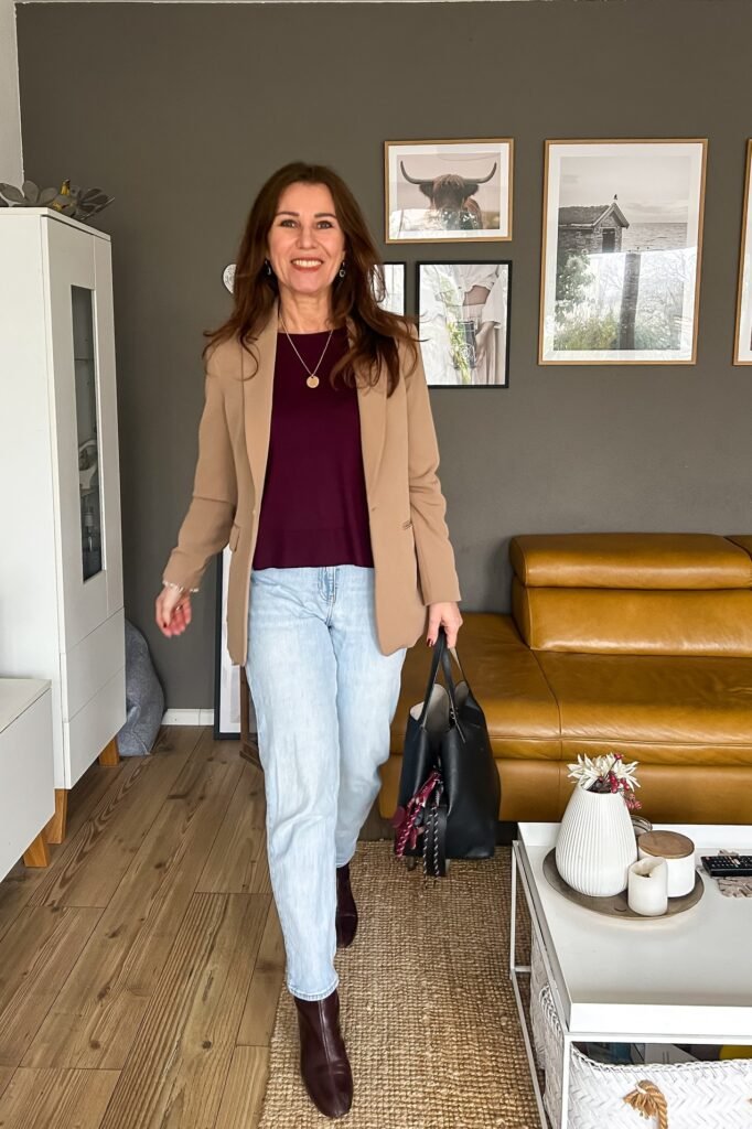 Camel Single-Breasted Blazer + Deep Burgundy Top + Light Wash Straight-Leg Jeans + Burgundy Leather Boots