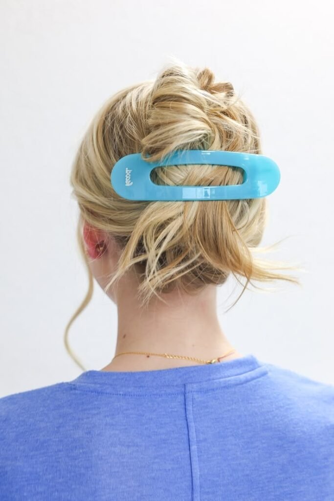 Casual Messy Bun with Bright Blue Oval Hair Barrette
