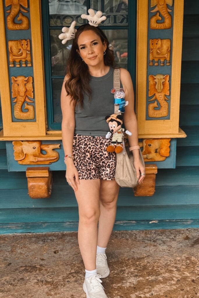 Charcoal Grey Tank Top + Leopard Print Shorts + Taupe Crossbody Bag with Plush Charms + White Sneakers