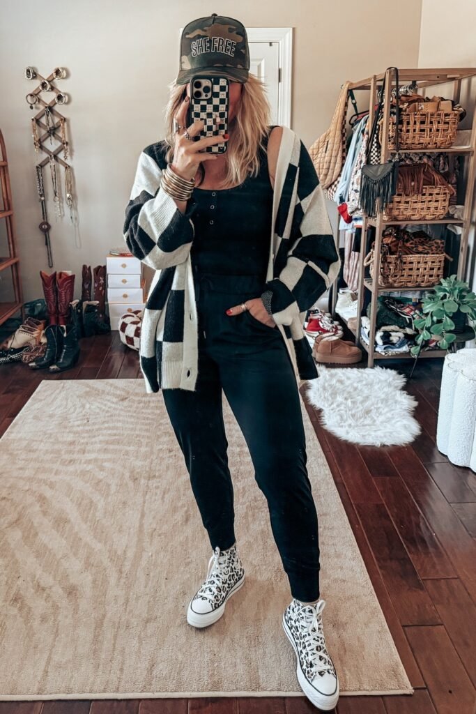 Checkered Oversized Cardigan + Black Jumpsuit + Leopard Print High-Top Sneakers + Camo Baseball Cap