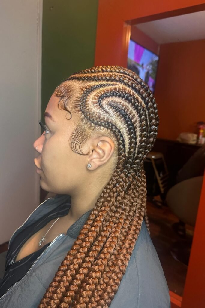 Copper-Toned Stitch Braids with Dramatic Side Swirl and Thick Ends