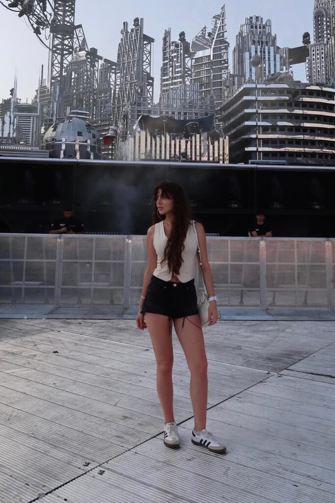 Cream Ribbed Vest + Black Denim Shorts + White Adidas Sneakers