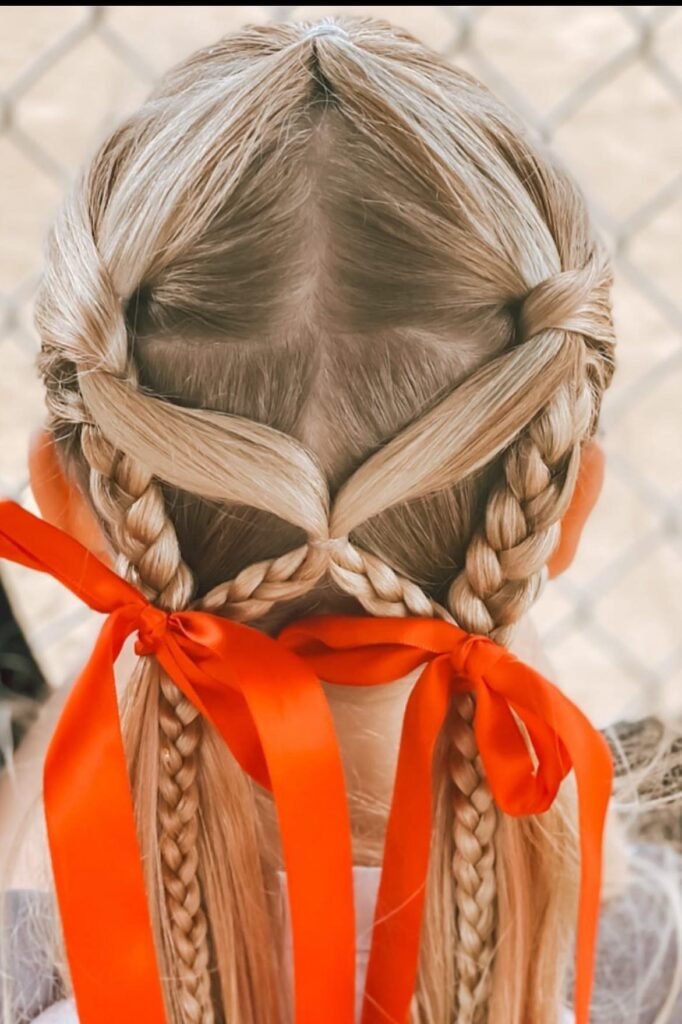 Criss-Cross Dutch Braids into Low Pigtails with Orange Ribbons