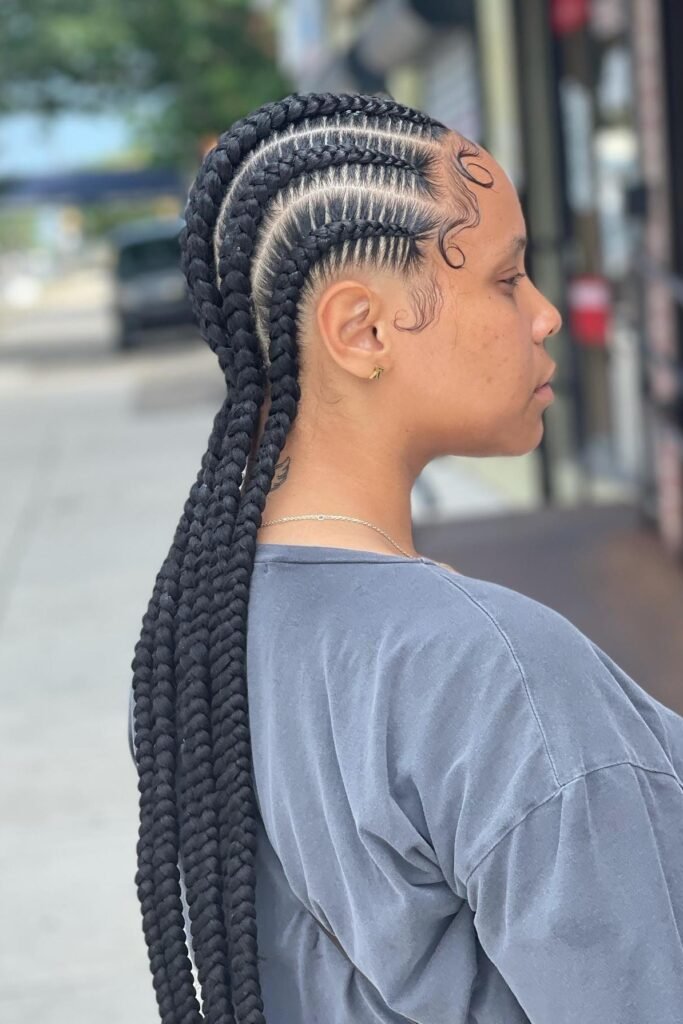 Curved Jumbo Feed-In Braids with Side Swoop Edges