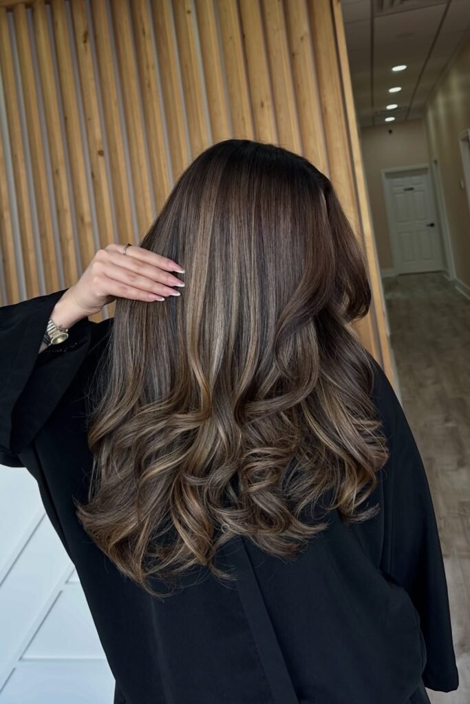 Deep Brown Wavy Hair with Soft Ash Blonde Highlights