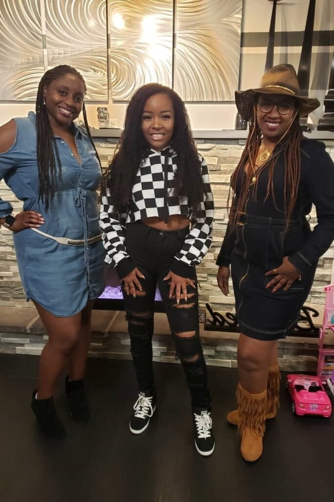 Denim Shirt Dress / Checkerboard Cropped Hoodie / Black Denim Zip Dress + Black Ripped Skinny Jeans + Black High-Top Sneakers / Tan Fringe Boots