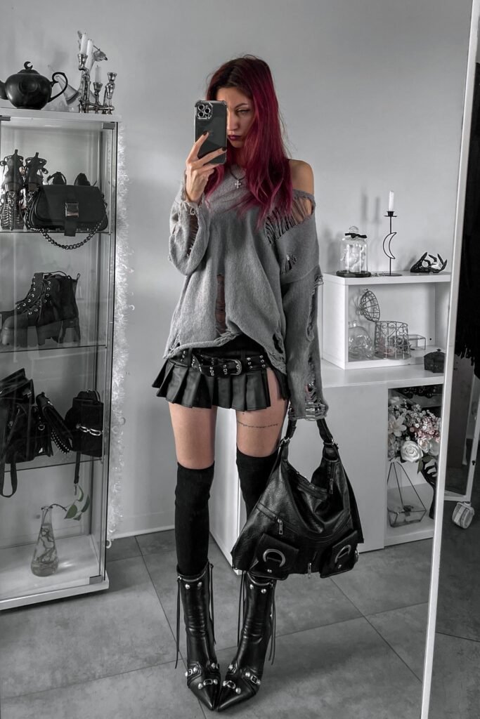 Distressed Grey Oversized Sweater + Black Pleated Micro Skirt + Black Over-the-Knee Socks + Studded Pointed Ankle Boots