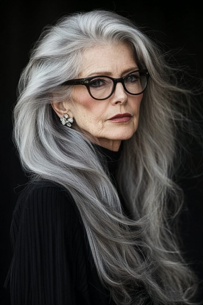 Dramatic Silver Flowing Tresses with Sleek Deep Side-Parted Volume