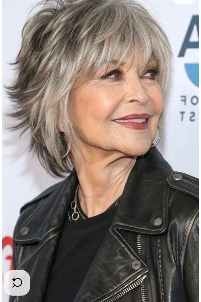 Edgy Textured Shag with Full Bangs and Flared Ends