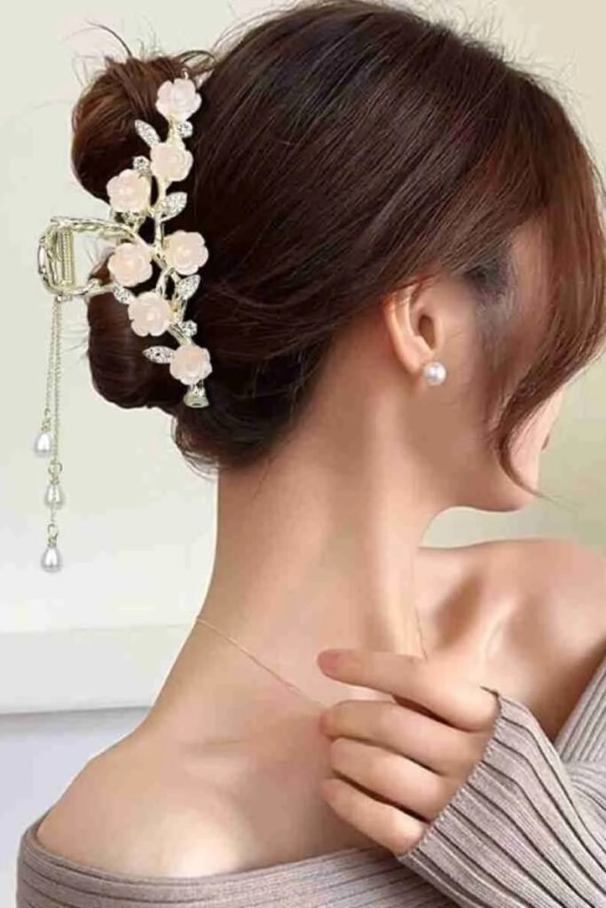 Elegant Low Chignon with Floral Crystal Tassel Clip