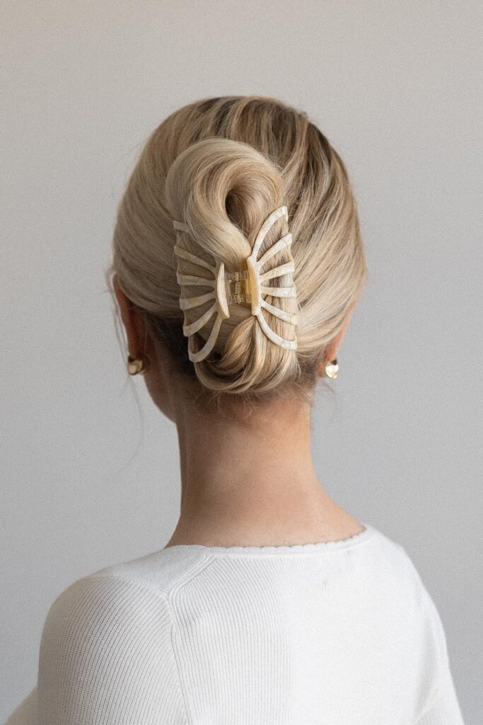 Elegant Vertical Roll Secured with a Cream Butterfly-Style Clip