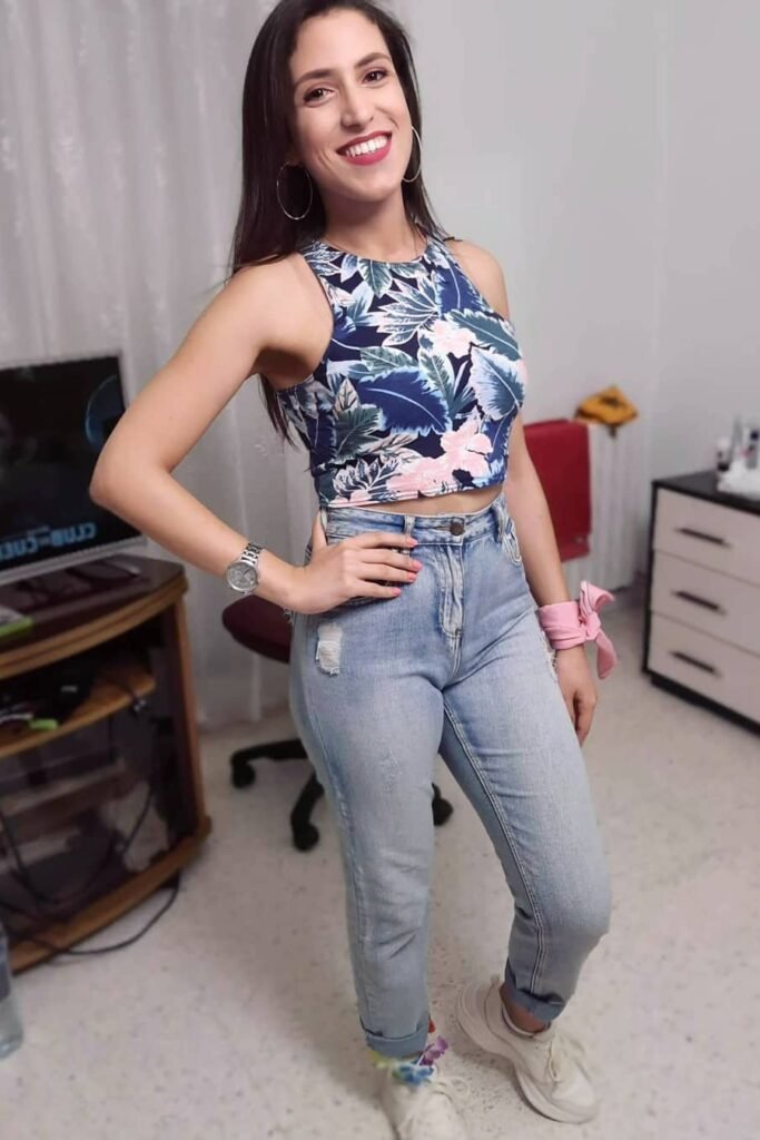 Floral High-Neck Crop Top + Distressed Light Wash Skinny Jeans + White Chunky Sneakers