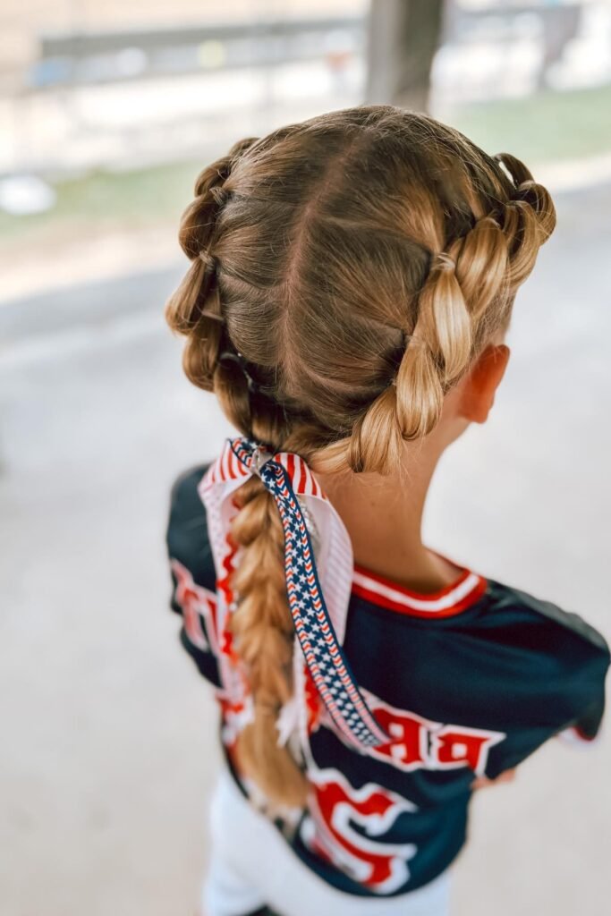 French Braid Pigtails Joined with a Patriotic Patterned Ribbon