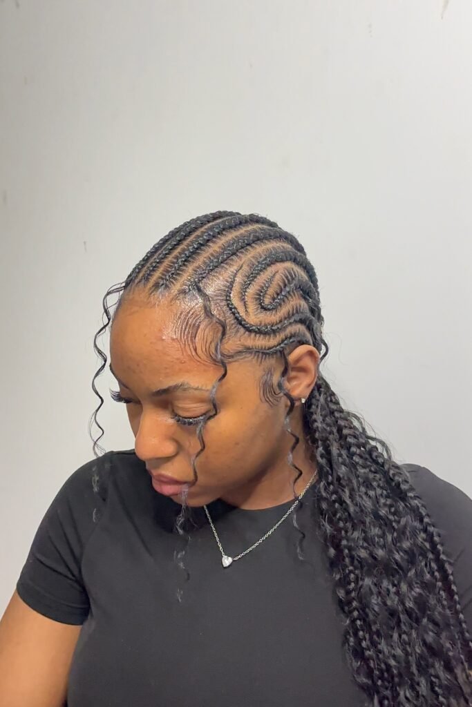 Geometric Curved Cornrows with Waist-Length Curly Extensions