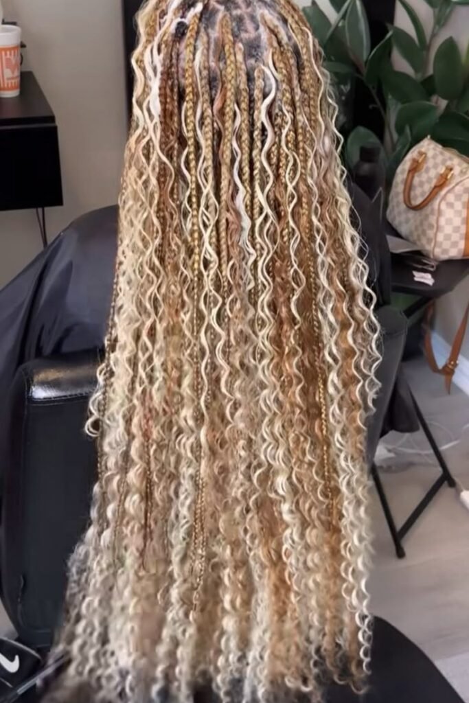 Goddess Box Braids with Mixed Blonde Tones and Wavy Tendrils