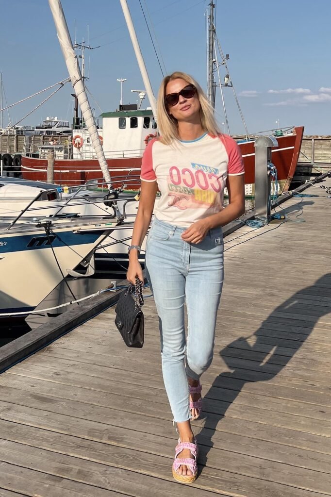 Graphic Ringer T-Shirt + Light Wash Skinny Jeans + Pink Strappy Sandals